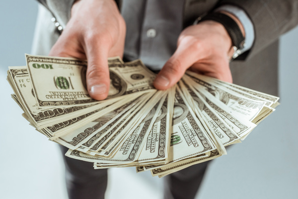 Man-holding-money-Stock-Photo-05